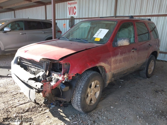 2005 Ford Escape XLT with VIN 1FMCU03155KC43333, listed as a IAAI auction lot 41391655 with 217,211 mi miles. Bid and sale history available at carsss.com. Image 17.