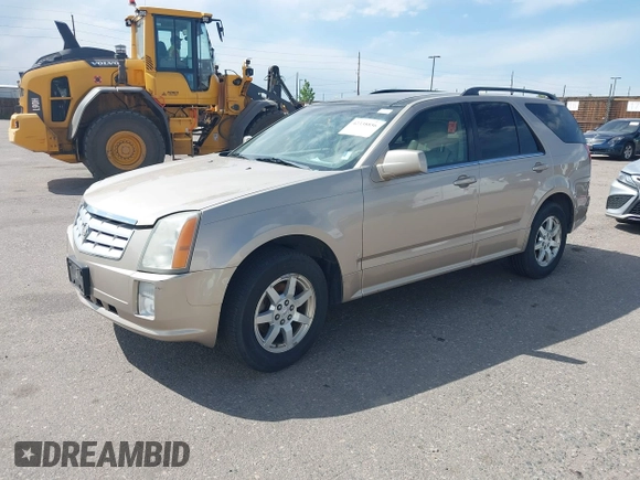 2006 Cadillac SRX z VIN 1GYEE637860206995, wystawiony jako IAAI lot #42338856 z przebiegiem 163 773 mil mil oraz . Historia ofert i sprzedaży dostępna na DreamBid. Obrazek 2.