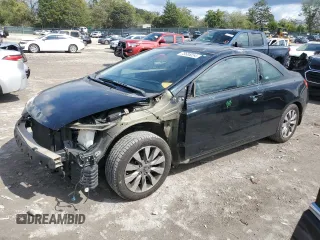 2009 Honda Civic Cpe EX-L with VIN 2HGFG12989H526829, listed as a Copart auction lot 73685054 with 169,968 mi miles and Salvage Title. Bid and sale history available at carsss.com. Image 1.