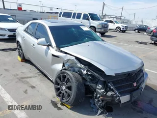 2008 Cadillac CTS RWD z VIN 1G6DV57VX80191927, wystawiony jako IAAI lot #42034611 z przebiegiem 95 426 mil mil oraz . Historia ofert i sprzedaży dostępna na DreamBid. Obrazek 1.