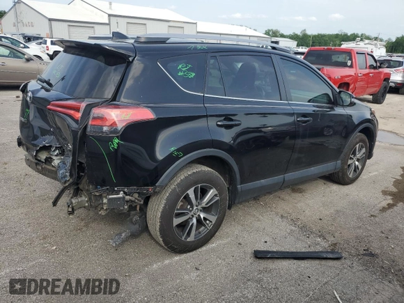 2018 Toyota RAV4 XLE with VIN 2T3WFREV3JW469307, listed as a Copart auction lot 57092295 with 47,639 mi miles and Salvage title. Bid and sale history available at DreamBid. Image 3.