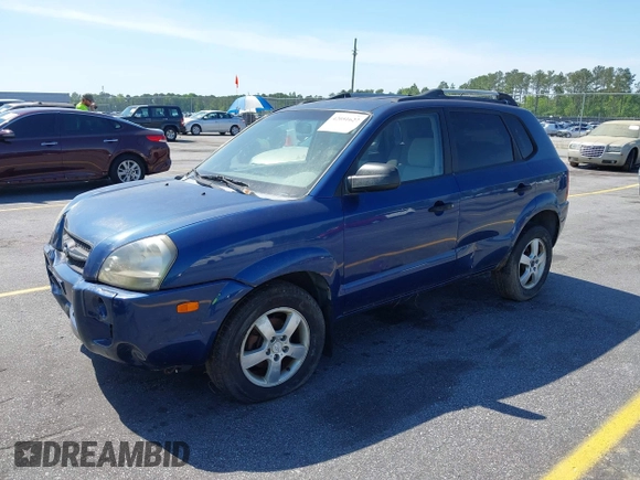 2005 Hyundai Tucson GL with VIN KM8JM12B85U233228, listed as a IAAI auction lot 42051627 with 170,742 mi miles. Bid and sale history available at carsss.com. Image 2.