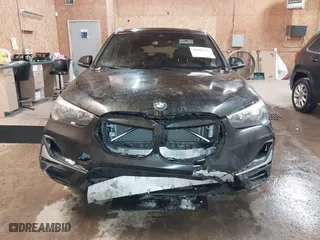 2020 BMW X1 xDrive28i with VIN WBXJG9C07L5P71792, listed as a IAAI auction lot 41583132 with 150,095 mi miles. Bid and sale history available at carsss.com. Image 12.
