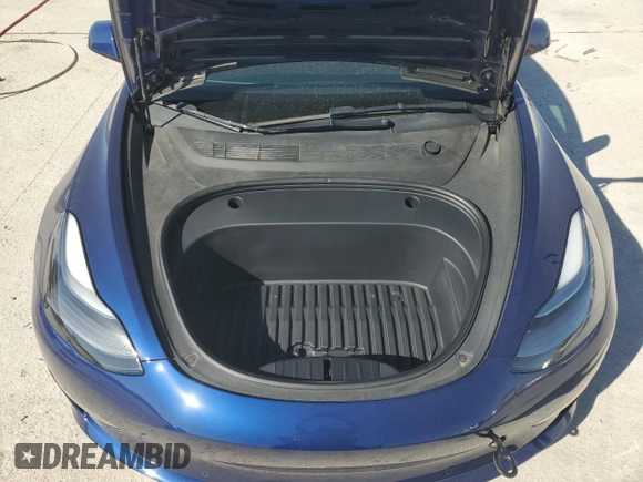 2022 Tesla Model 3 with VIN 5YJ3E1EA8NF322335, listed as a Copart auction lot 48187265 with 22,265 mi miles and Clean Title. Bid and sale history available at DreamBid. Image 11.