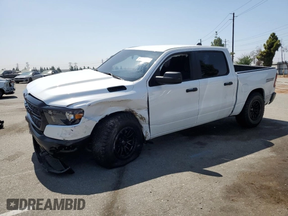 2023 Ram 1500 Tradesman with VIN 1C6SRFGT7PN684311, listed as a Copart auction lot 69792804 with 13,946 mi miles and Salvage title. Bid and sale history available at DreamBid. Image 1.
