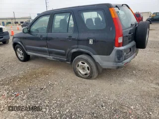 2002 Honda CR-V LX z VIN JHLRD68472C024693, wystawiony jako Copart lot #57076495 z przebiegiem 294 743 mil mil oraz Czysty tytuł • Clean title. Historia ofert i sprzedaży dostępna na DreamBid. Obrazek 2.