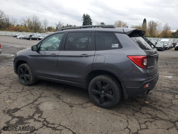 2021 Honda Passport Elite with VIN 5FNYF8H09MB009212, listed as a Copart auction lot 81856694 with 96,717 mi miles and Salvage Title. Bid and sale history available at carsss.com. Image 2.