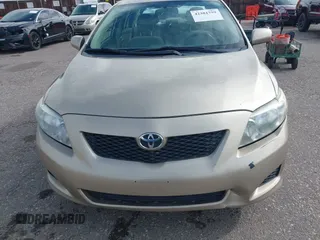 2009 Toyota Corolla with VIN 1NXBU40E09Z078912, listed as a IAAI auction lot 42381759 with 202,353 mi miles and . Bid and sale history available at DreamBid. Image 6.