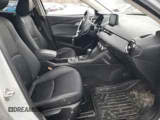 2019 Mazda CX-3 Touring with VIN JM1DKFC78K0405131, listed as a Copart auction lot 87065614 with 91,091 mi miles and Salvage Title. Bid and sale history available at carsss.com. Image 7.