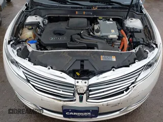 2015 Lincoln MKZ Hybrid with VIN 3LN6L2LU3FR612824, listed as a IAAI auction lot 41475840 with 122,499 mi miles and . Bid and sale history available at carsss.com. Image 10.