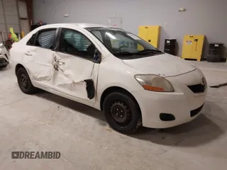 2009 Toyota Yaris with VIN JTDBT903994054207, listed as a IAAI auction lot 41991534 with 176,820 mi miles. Bid and sale history available at carsss.com. Image 1.