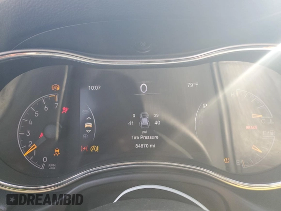 2018 Jeep Grand Cherokee Laredo with VIN 1C4RJFAG7JC249916, listed as a Copart auction lot 53446925 with 84,870 mi miles and Salvage title. Bid and sale history available at DreamBid. Image 9.
