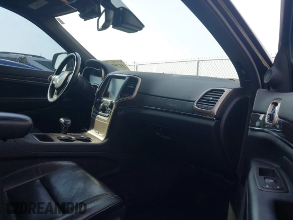 2014 Jeep Grand Cherokee Overland with VIN 1C4RJECG4EC197433, listed as a IAAI auction lot 41769932 with 198,568 mi miles. Bid and sale history available at carsss.com. Image 5.