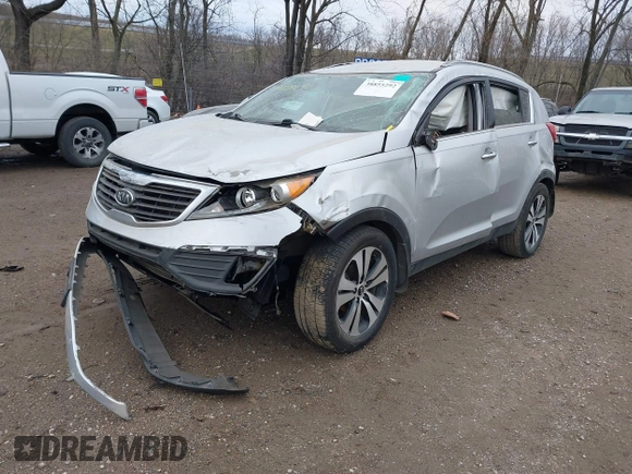 2011 Kia Sportage EX with VIN KNDPC3A25B7051396, listed as a IAAI auction lot 38855292 with 263,407 mi miles and . Bid and sale history available at DreamBid. Image 2.