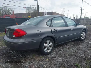 2002 Ford Taurus SE Standard with VIN 1FAFP53U42A109002, listed as a IAAI auction lot 42153281 with 156,115 mi miles and . Bid and sale history available at DreamBid. Image 4.