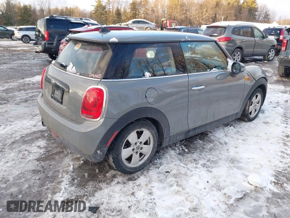 2019 MINI Hardtop Cooper with VIN WMWXP5C52K2H91038, listed as a IAAI auction lot 41509304 with 77,123 mi miles and . Bid and sale history available at DreamBid. Image 4.
