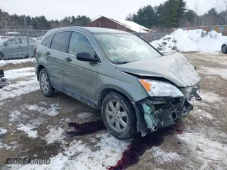 2007 Honda CR-V EX with VIN JHLRE48567C084594, listed as a IAAI auction lot 41392646 with 143,786 mi miles. Bid and sale history available at carsss.com. Image 1.