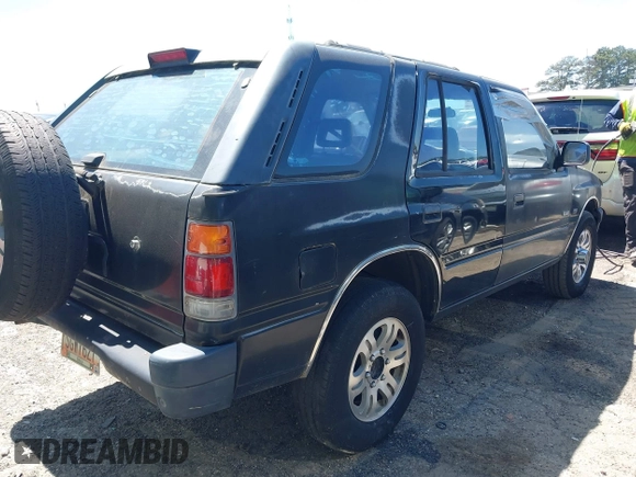 1996 Isuzu Rodeo z VIN 4S2CK58V1T4342739, wystawiony jako IAAI lot #42058798 z przebiegiem 268 502 mil mil oraz . Historia ofert i sprzedaży dostępna na DreamBid. Obrazek 4.