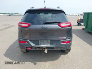 2016 Jeep Cherokee Trailhawk z VIN 1C4PJMBS1GW323434, wystawiony jako IAAI lot #42485364 z przebiegiem 130 351 mil mil oraz . Historia ofert i sprzedaży dostępna na DreamBid. Obrazek 17.
