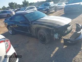 2005 Ford Mustang GT Deluxe with VIN 1ZVHT82H455205677, listed as a IAAI auction lot 42651512 with 221,876 mi miles and . Bid and sale history available at DreamBid. Image 1.