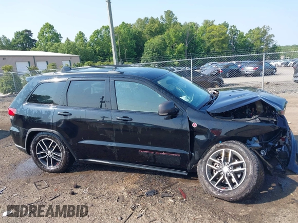 2018 Jeep Grand Cherokee Trailhawk with VIN 1C4RJFLG4JC241057, listed as a IAAI auction lot 42416590 with 81,822 mi miles and . Bid and sale history available at DreamBid. Image 13.