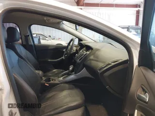 2013 Ford Focus SE z VIN 1FADP3F2XDL255868, wystawiony jako IAAI lot #42267492 z przebiegiem 144 640 mil mil oraz . Historia ofert i sprzedaży dostępna na DreamBid. Obrazek 5.