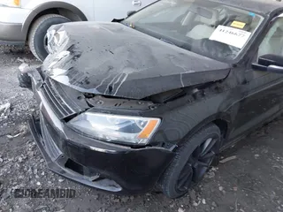 2014 Volkswagen Jetta Sedan SE w/Connectivity with VIN 3VWD07AJ4EM388319, listed as a IAAI auction lot 41246677 with 84,428 mi miles. Bid and sale history available at carsss.com. Image 6.