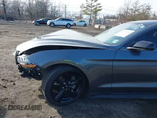 2021 Ford Mustang EcoBoost with VIN 1FA6P8TH4M5136345, listed as a IAAI auction lot 41503885 with 18,853 mi miles. Bid and sale history available at carsss.com. Image 6.