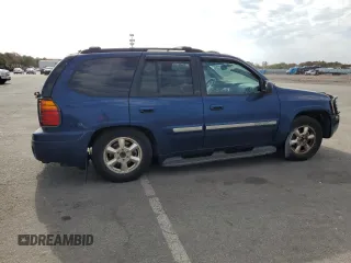 2002 GMC Envoy SLT with VIN 1GKDT13SX22250823, listed as a Copart auction lot 77763094 with 71,005 mi miles and Non Repairable. Bid and sale history available at carsss.com. Image 3.