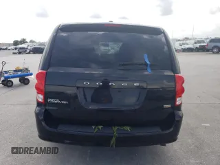 2018 Dodge Grand Caravan SE Plus with VIN 2C4RDGBG2JR199767, listed as a Copart auction lot 54182325 with 137,522 mi miles and Salvage Title. Bid and sale history available at DreamBid. Image 6.