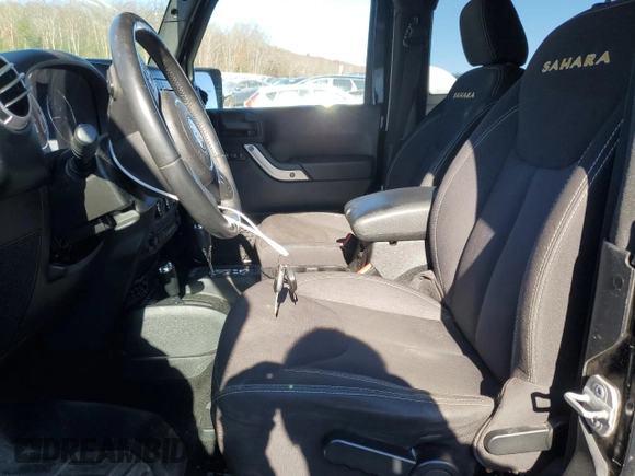 2014 Jeep Wrangler Sahara with VIN 1C4AJWBG2EL194843, listed as a Copart auction lot 79590514 with 80,574 mi miles and Non Repairable. Bid and sale history available at DreamBid. Image 7.