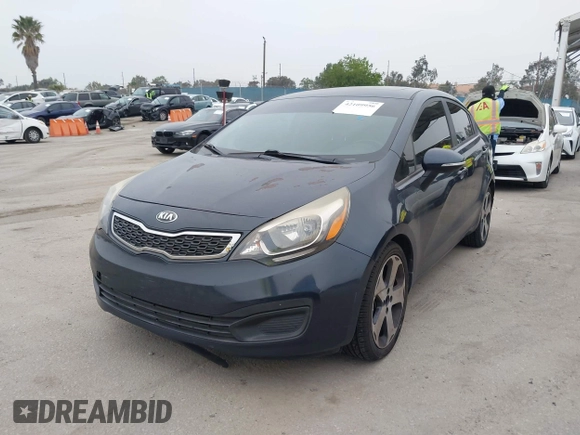 2013 Kia Rio SX with VIN KNADN4A30D6284121, listed as a IAAI auction lot 42109956 with 79,883 mi miles. Bid and sale history available at carsss.com. Image 2.