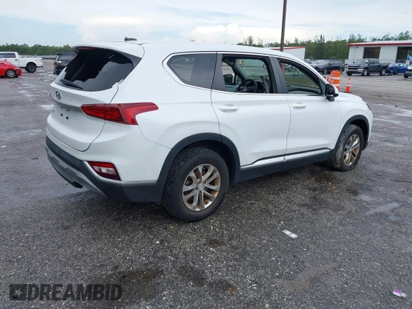 2019 Hyundai Santa Fe SE with VIN 5NMS23ADXKH038506, listed as a IAAI auction lot 42407399 with 54,540 mi miles and . Bid and sale history available at DreamBid. Image 4.