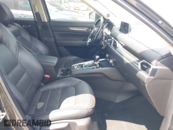 2017 Mazda CX-5 Grand Touring with VIN JM3KFADL3H0227655, listed as a IAAI auction lot 41897981 with 103,545 mi miles. Bid and sale history available at carsss.com. Image 5.