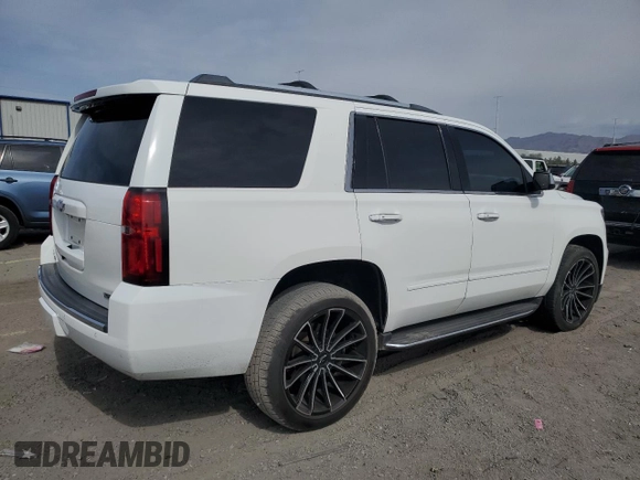 2018 Chevrolet Tahoe Premier with VIN 1GNSKCKC6JR195246, listed as a Copart auction lot 54887165 with 135,973 mi miles and Salvage title. Bid and sale history available at DreamBid. Image 3.