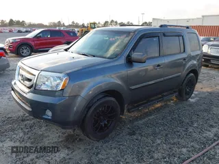 2010 Honda Pilot EX with VIN 5FNYF3H44AB006218, listed as a IAAI auction lot 41649588 with 209,830 mi miles and . Bid and sale history available at carsss.com. Image 2.