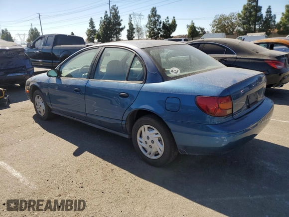 2001 Saturn SL z VIN 1G8ZF52861Z275529, wystawiony jako Copart lot #74153154 z przebiegiem 171 272 mil mil oraz Tytuł czysty. Historia ofert i sprzedaży dostępna na DreamBid. Obrazek 2.