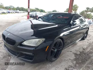 2014 BMW 6 Series 650i z VIN WBA6B2C57ED129681, wystawiony jako IAAI lot #42517803 z przebiegiem 208 644 mil mil oraz . Historia ofert i sprzedaży dostępna na DreamBid. Obrazek 20.