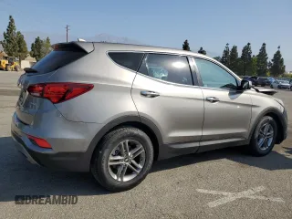 2017 Hyundai Santa Fe 2.4L with VIN 5XYZT3LB0HG392609, listed as a Copart auction lot 62553505 with 69,774 mi miles and Salvage title. Bid and sale history available at DreamBid. Image 3.