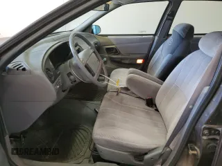 1992 Ford Taurus z VIN 1FACP50U4NA144506, wystawiony jako Copart lot #80000064 z przebiegiem 40 600 mil mil oraz Czysty tytuł • Clean title. Historia ofert i sprzedaży dostępna na DreamBid. Obrazek 7.