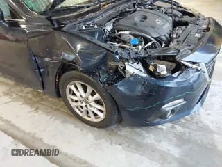 2016 Mazda 3 i Touring with VIN JM1BM1L71G1343674, listed as a IAAI auction lot 41630218 with 70,052 mi miles and . Bid and sale history available at DreamBid. Image 6.