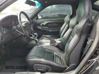 1999 Porsche 911 z VIN WP0AA2990XS626600, wystawiony jako Copart lot #56749505 z przebiegiem 82 979 mil mil oraz Szkody całkowita. Historia ofert i sprzedaży dostępna na DreamBid. Obrazek 7.