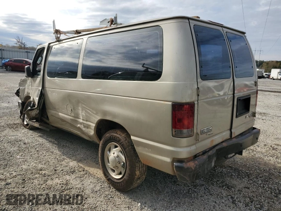2010 Ford Econoline Passenger XL with VIN 1FMNE1BWXADA30935, listed as a Copart auction lot 77912734 with 153,775 mi miles and Salvage Title. Bid and sale history available at DreamBid. Image 2.
