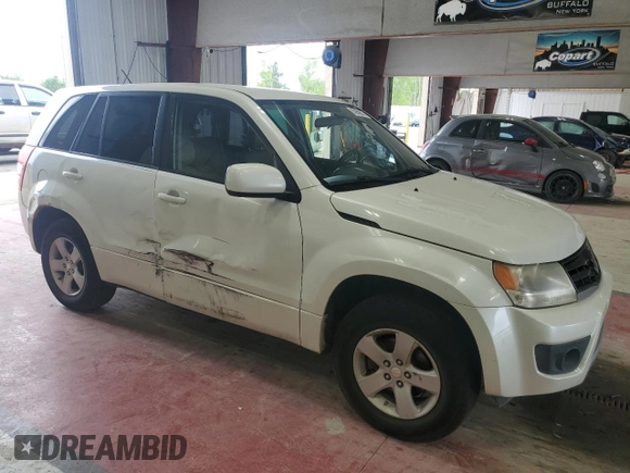 2013 Suzuki Grand Vitara Premium with VIN JS3TD0D64D4100568, listed as a Copart auction lot 63958985 with 140,668 mi miles and Salvage title. Bid and sale history available at DreamBid. Image 4.