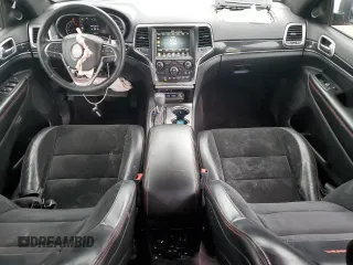 2017 Jeep Grand Cherokee Trailhawk with VIN 1C4RJFLG7HC674060, listed as a Copart auction lot 61130225 with 79,351 mi miles and Salvage title. Bid and sale history available at DreamBid. Image 8.