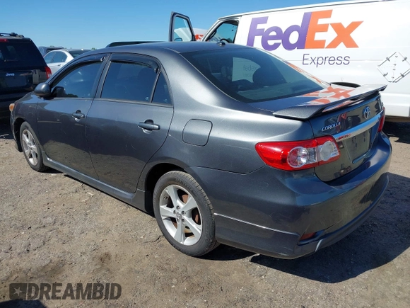 2011 Toyota Corolla L with VIN 2T1BU4EE2BC684289, listed as a IAAI auction lot 42027474 with 214,657 mi miles. Bid and sale history available at carsss.com. Image 3.