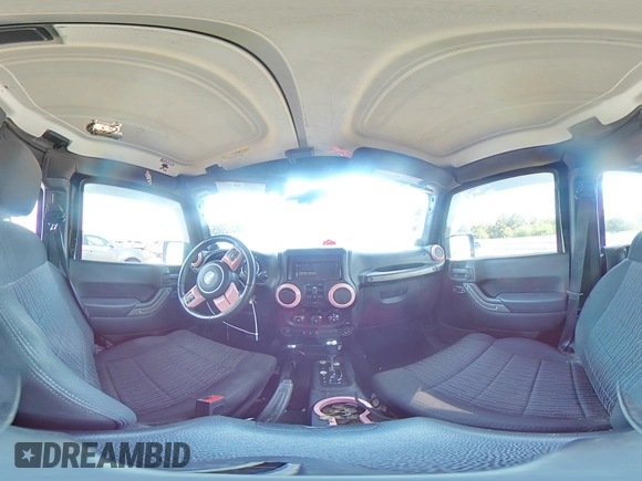 2012 Jeep Wrangler Unlimited Sport with VIN 1C4BJWDG8CL116811, listed as a Copart auction lot 59372085 with 95,498 mi miles and Salvage title. Bid and sale history available at DreamBid. Image 14.