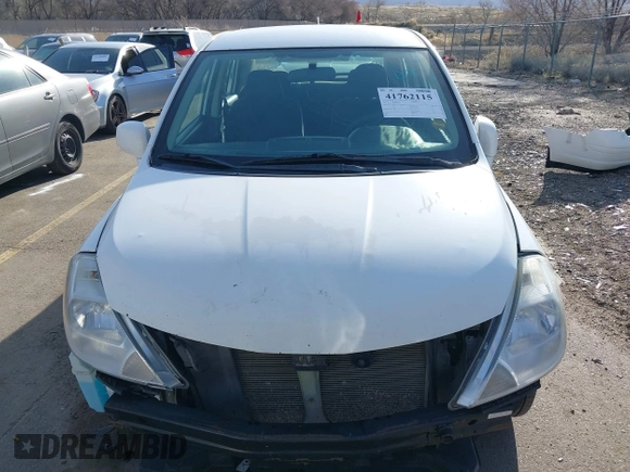 2010 Nissan Versa 1.8 S with VIN 3N1BC1AP8AL465537, listed as a IAAI auction lot 41762115 with 163,533 mi miles and . Bid and sale history available at carsss.com. Image 12.