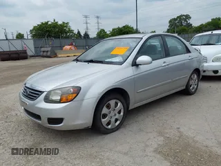 2009 Kia Spectra EX with VIN KNAFE221995613874, listed as a IAAI auction lot 42467453 with 104,158 mi miles and . Bid and sale history available at DreamBid. Image 2.