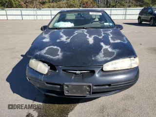 1997 Ford Thunderbird LX z VIN 1FALP62W9VH112212, wystawiony jako Copart lot #75232034 z przebiegiem 138 666 mil mil oraz Szkoda całkowita • Salvage title. Historia ofert i sprzedaży dostępna na DreamBid. Obrazek 5.